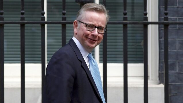 Britain’s Justice Secretary Michael Gove leaves after a cabinet meeting at number 10 Downing Street, in central London