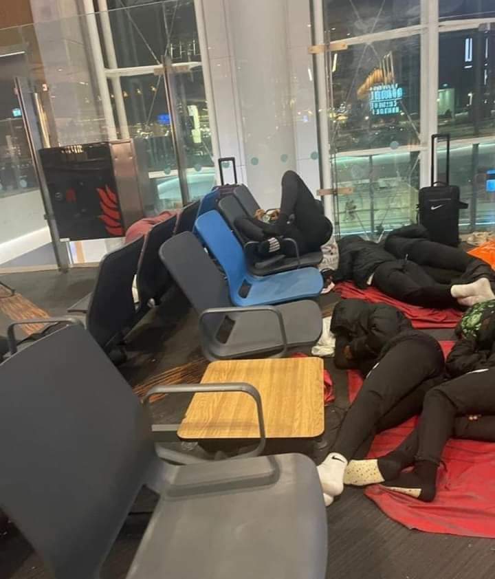 players of Super Falconets, Nigeria's junior female football team sleeping on chairs and floors at Istanbul airport, Turkey