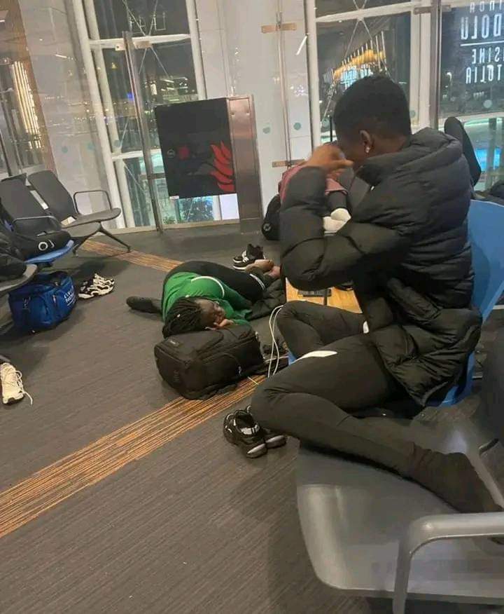 players of Super Falconets, Nigeria's junior female football team sleeping on chairs and floors at Istanbul airport, Turkey