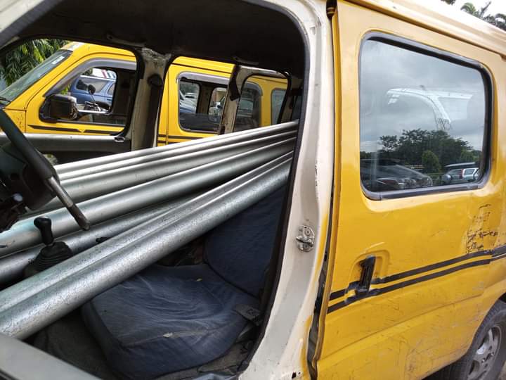 The bus carrying 13 bars of vandalised protective railings: Intercepted on Carter Bridge in Ijora area of Lagos