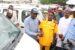 Gov. Abdulrazaq represented by the Commissioner for Works, Mr Iliasu Rotimi presents the buses to the NURTW and RTEAN officials