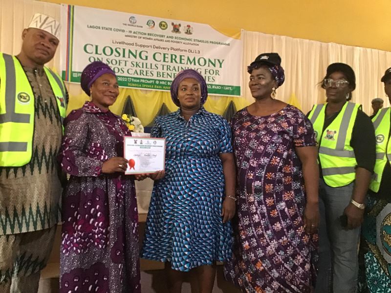 One of the beneficiaries being presented certificate by Mrs. Salami