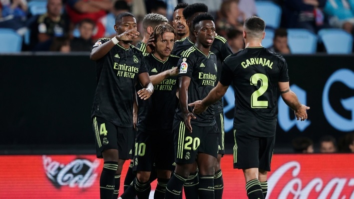 Real Madrid players celebrating Modric's goal