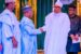 President Muhammadu Buhari, President, Federal Republic of Nigeria (2nd Right) having a handshake with Abdul Samad Rabiu, Founder & Executive Chairman, BUA Group (2nd Left) while Kabiru Rabiu, Group Executive Director, BUA Group (Left) and Niyi Adebayo, Nigerian Minister of Industry, Trade and Investment (Right) looks on during the visit of Abdul Samad Rabiu and BUA Group Management Team, to the State House in Abuja, today.