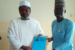 Sheikh Ibrahim Khalil, the governorship candidate of African Democratic Congress (ADC) in Kano (left) receiving a document on the Kano Citizens’ Charter of Demands, from the Partnership to Engage, Reform and Learn (PERL), a Non-Governmental Organisation (NGO).