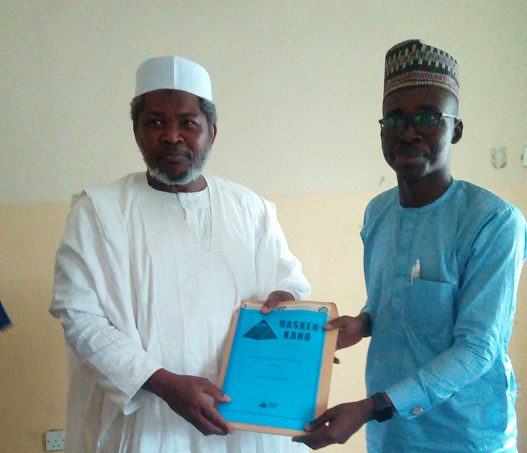 Sheikh Ibrahim Khalil, the governorship candidate of African Democratic Congress (ADC) in Kano (left) receiving a document on the Kano Citizens’ Charter of Demands, from the Partnership to Engage, Reform and Learn (PERL), a Non-Governmental Organisation (NGO).