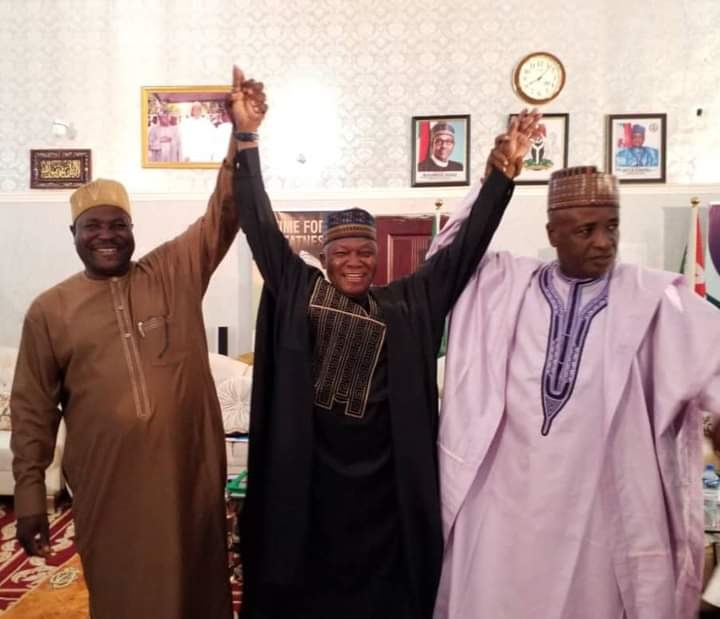 Sokoto Commissioner for Careers and Security Matters retired Colonel Garba Moyi Isa (middle) when he was received into the All Progressives Congress, APC by Senator Wamakko.