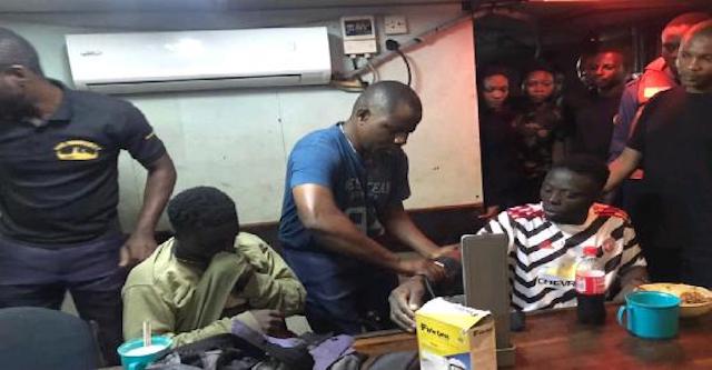the two Ghanaian fishermen receiving medical attention