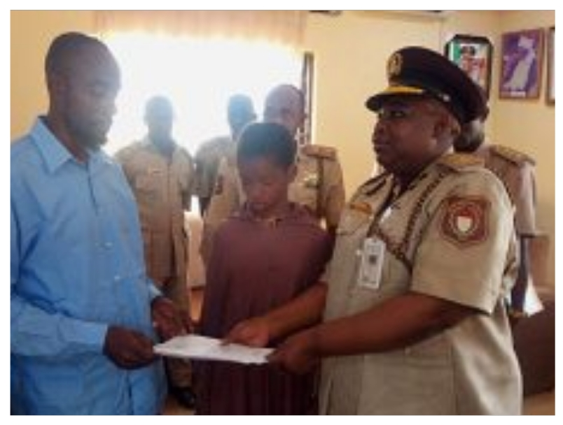 NIS handing over the Libya bound Ogun 13-yr-old-girl to NAPTIP officials