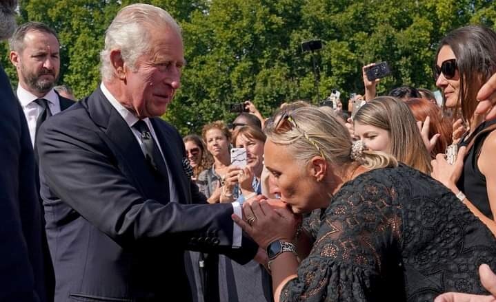 King Charles III meeting with mourners of Queen Elizabeth outside Buckingham Palace