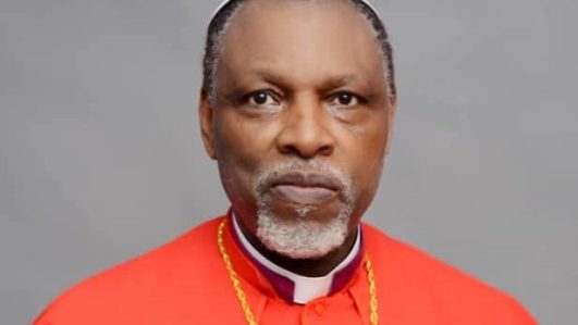 President Buhari rejoices with Rev. Ositelu