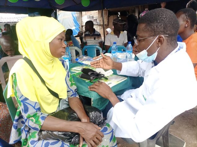 One of the beneficiaries of Dexa Medica free medical services at Agbara market in Agbara, Ogun State being attended to  i