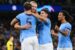 Man. City players celebrate their second goal with Haaland