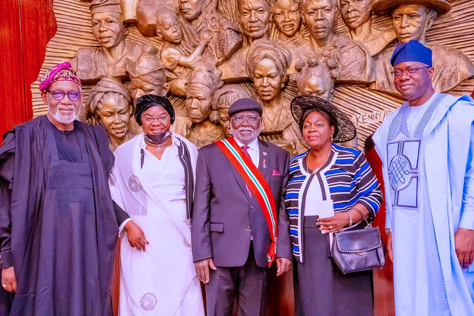 President Muhammadu Buhari, Vice President Yemi Osinbajo, Justice Olukayode Ariwoola and members of his family after he was sworn in as substantive Chief Justice of Nigeria at the Council chamber of the State House, Abuja, on Wednesday.