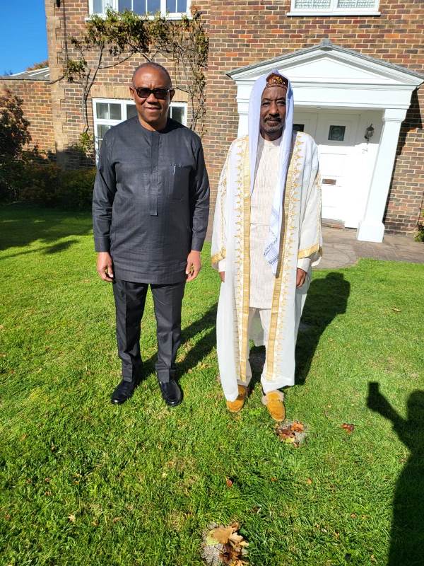 The LP's presidential candidate with Sanusi in UK