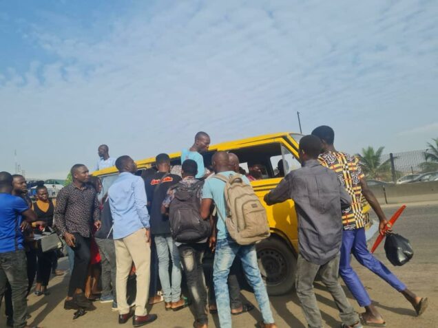 Lagos residents struggling to get a bus to their destination