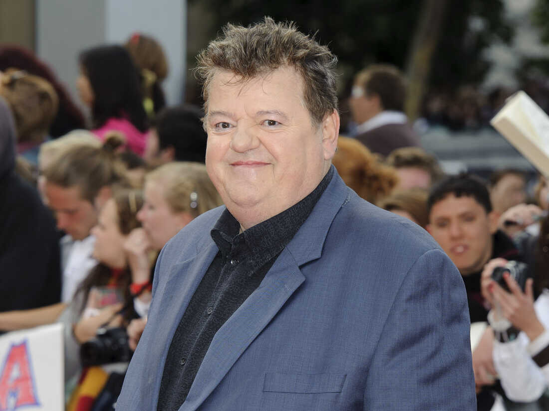 FILE - Robbie Coltrane arrives in Trafalgar Square, central London, for the world premiere of "Harry Potter and The Deathly Hallows: Part 2," the last film in the series on July 7, 2011. Coltrane, who played a forensic psychologist on TV series “Cracker” and Hagrid in the “Harry Potter” movies, has died. Coltrane’s agent Belinda Wright said he died Friday at a hospital in Scotland. He was 72. (AP Photo/Jonathan Short, File)