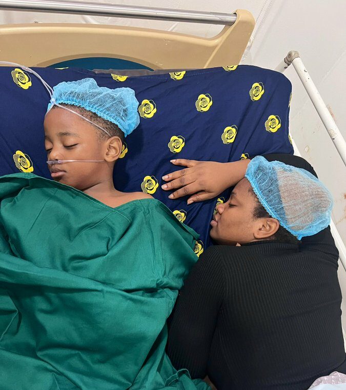 Dominic and her son on sickbed