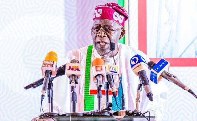 Asiwaju Bola Tinubu addressing the large gathering