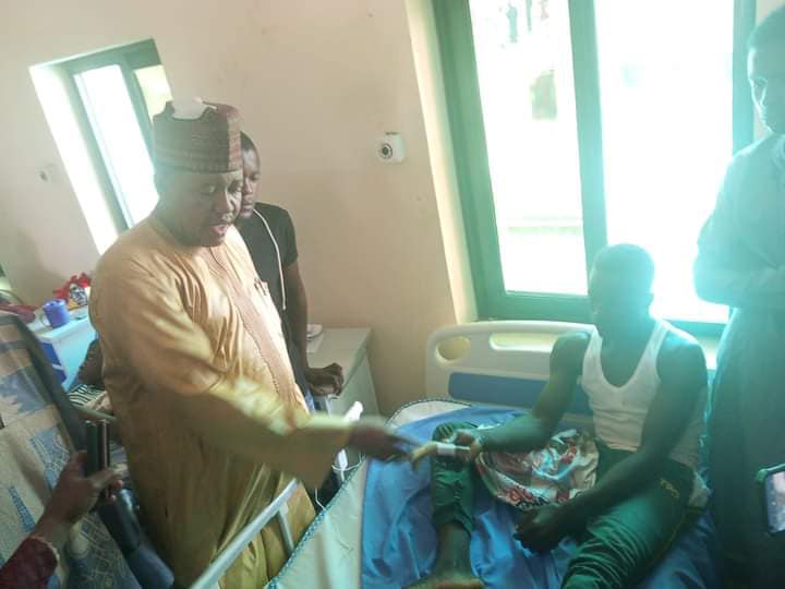 Zamfara APC Chairman giving money to one of supporters injured by thugs