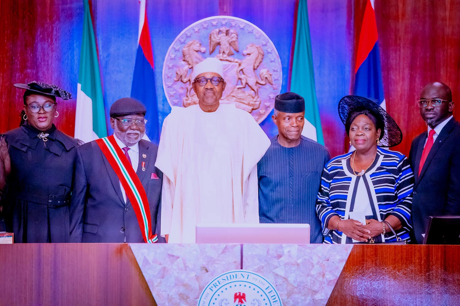 President Muhammadu Buhari, Vice President Yemi Osinbajo, Justice Olukayode Ariwoola and members of his family after he was sworn in as substantive Chief Justice of Nigeria at the Council chamber of the State House, Abuja, on Wednesday.