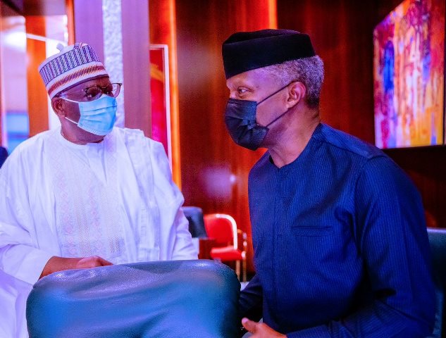 Osinbajo with another FEC member at the meeting