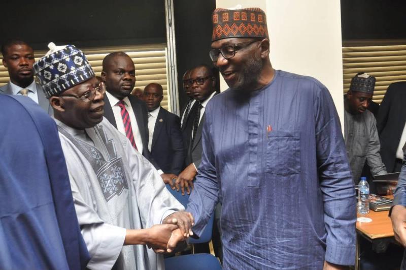 Tinubu with one of the PCC members