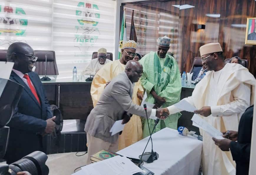 Chairman, INEC, Prof. Mahmood Yakubu with some of the 19 new Resident Electoral Commissioners (RECs),