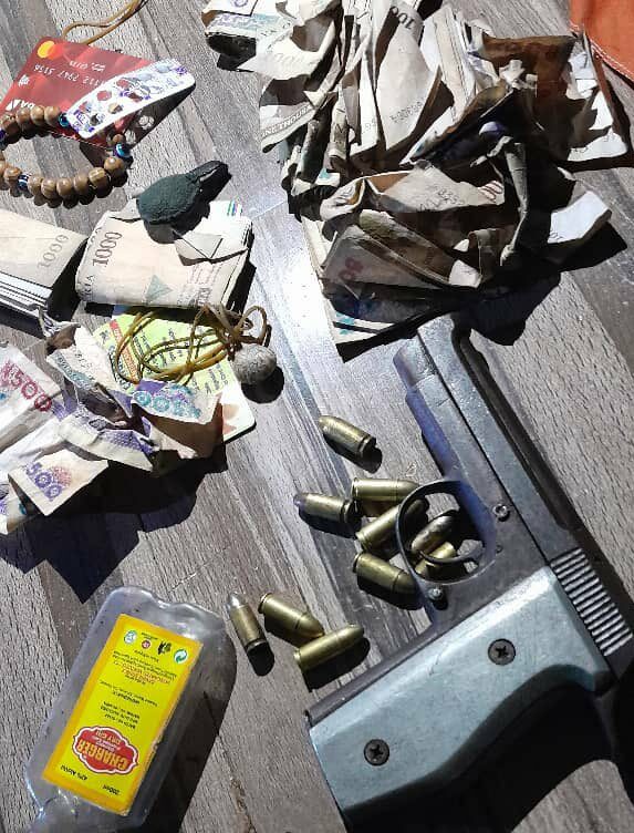 A suspect arrested during a routine stop-and-search operation Badagry area of Lagos abandoned his bag which was later found to contain a pistol and ammunition and ran away on the way to police station.