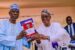 NUC Executive Secretary, Prof. Abubakar Rasheed presenting Letter of Recognition for the official take off of University of Ilesa to governor of Osun State, Adegboyega Oyetola
