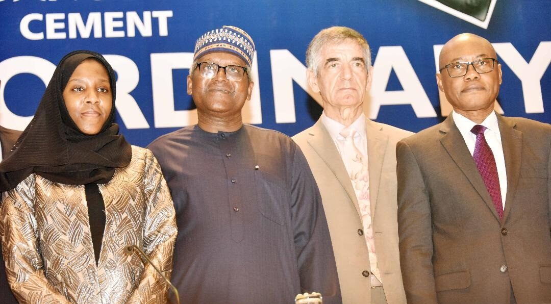 Aliko Dangote at with the management of the company at the Extraordinary General Meeting