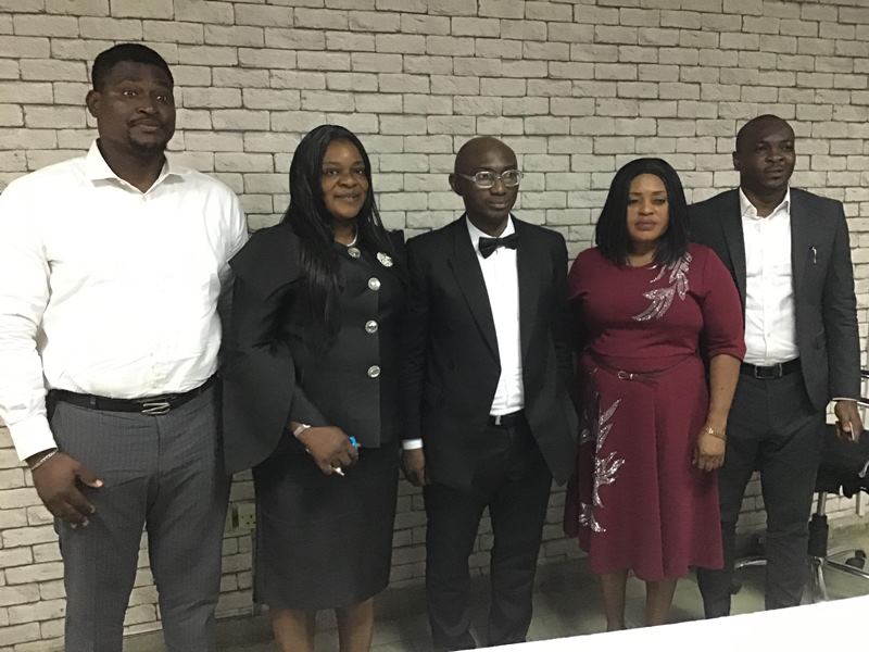 Ayemibo (middle) and others at the unveiling