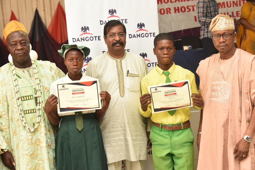 L-R, Dangote Fertilizer General Manager Haman/ Admin, Olusegun Basorun , Chief Mufutau Dauda, Baale of Magbon Segun / Chairman of Baale in Ibeju- Lekki, Bello Shakirat, One of the beneficiary, Student from Community High school Lekki, Dangote Industries Limited, Group Executive Director, Strategy, Capital Projects & Portfolio Development, Devakumar Edwin, Ajangboju Moruff, beneficiary From Community Senior High school Magon Segun, Hon. Tosin Osunnuga, Secretary Lekki LCDA, who represented the Chairman of Lekki LCDA, at the 2022 Scholarship award to qualified secondary and tertiary students of the host communities Youths of the Dangote Refinery and Fertiliser Projects Lekki Lagos on 28th DECEMBER 2022
