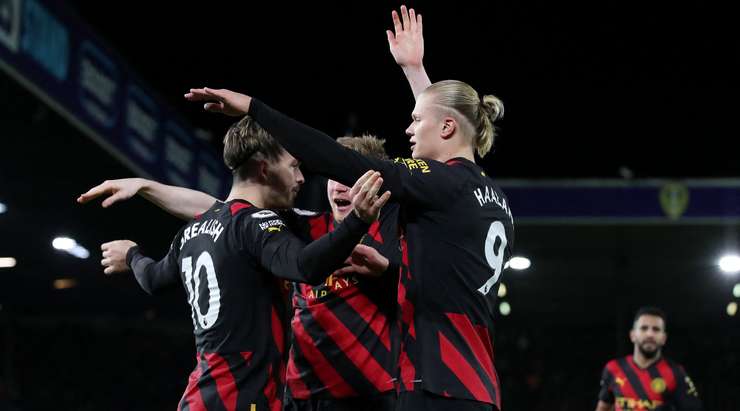 City players celebrate with Haaland