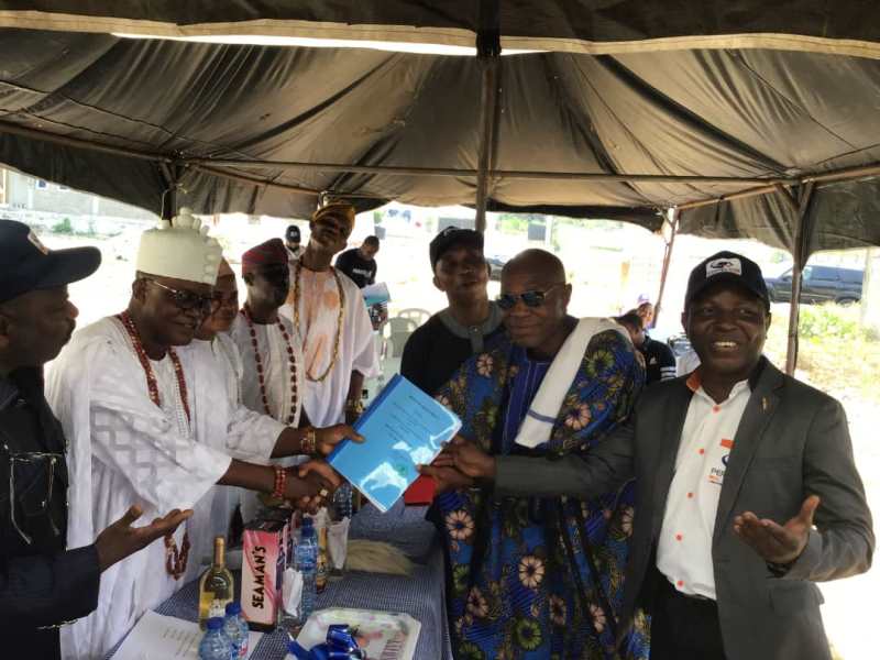 From right is Dr. Niyi Adeleye with Oba Olusegun Ebenezer Oyiri at the allocation of apartments to subscribers at Perfection Housing Estate