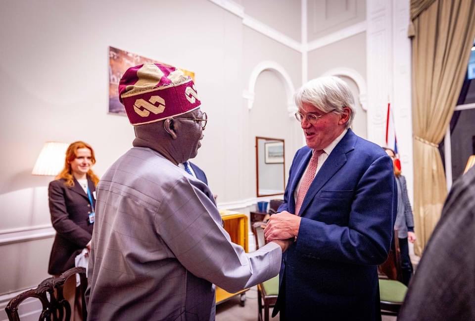 Tinubu and Mitchell before their closed-door meeting in London.