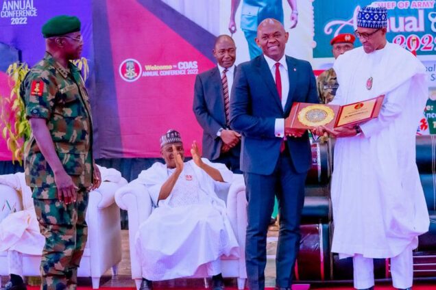 Tony Elumelu receiving award from President Buhari