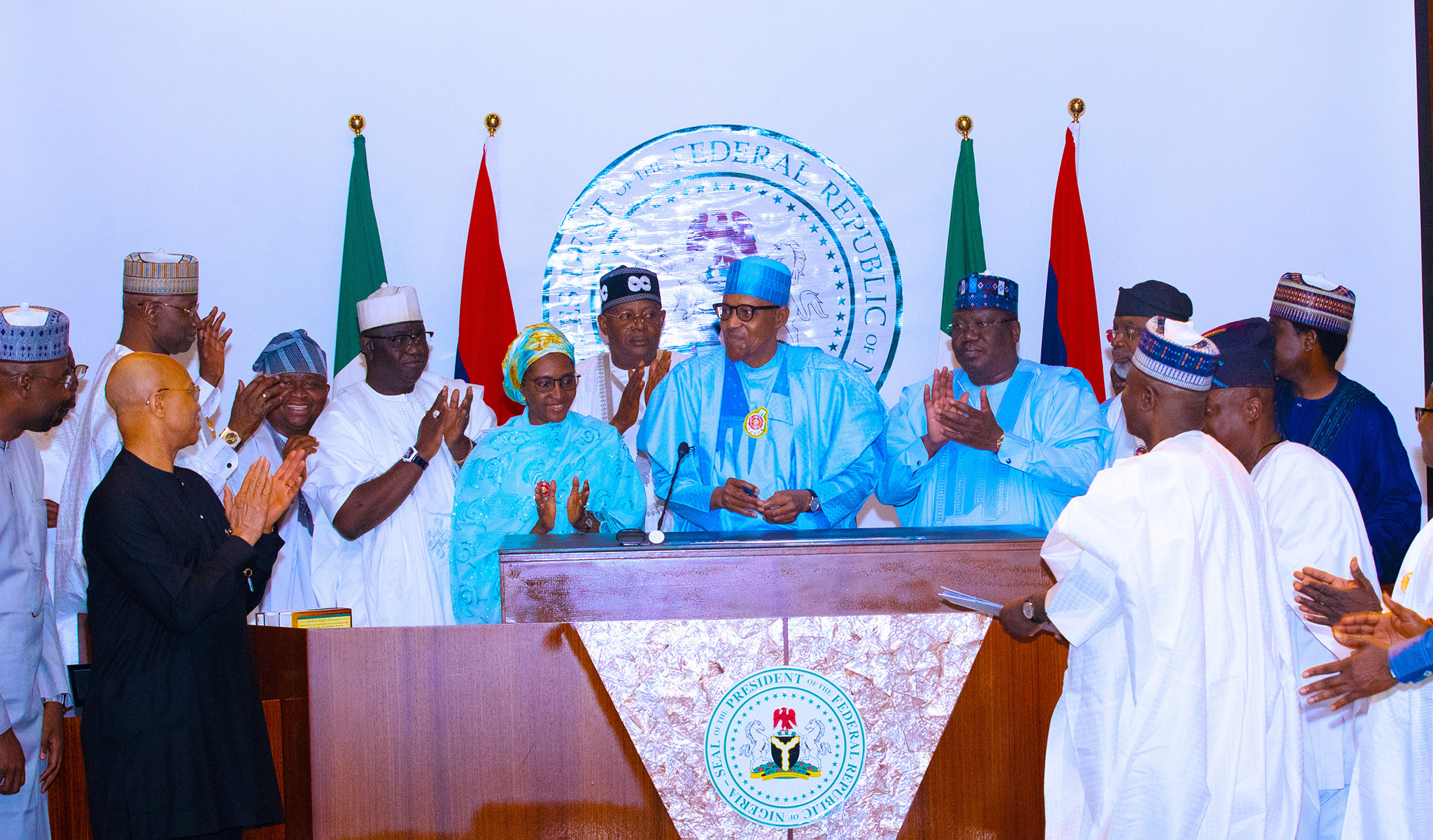 The president with Lawan and others at the signing of the budget on Tuesday.