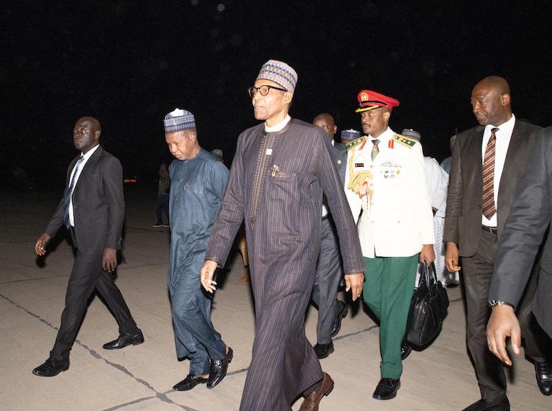 Buhari and Governor Masari leave the airport