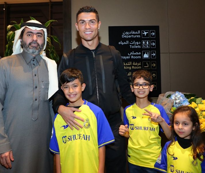 The Portuguese football star with some kids and host 