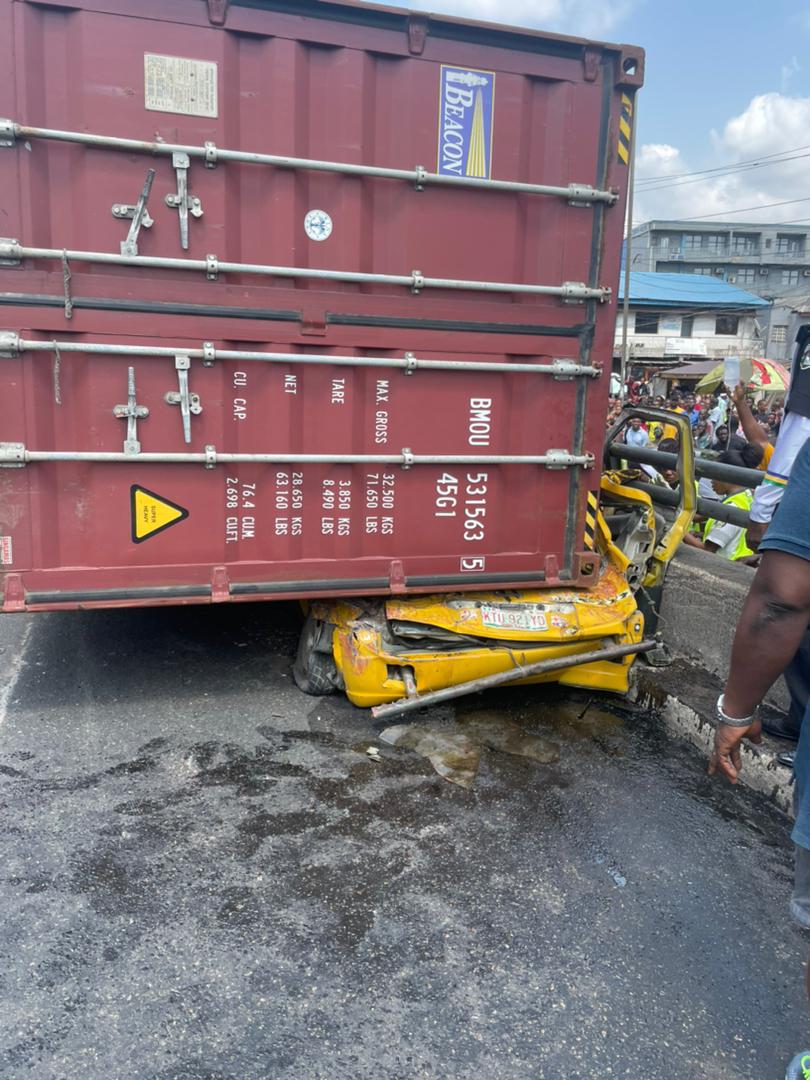 The container crushed the bus