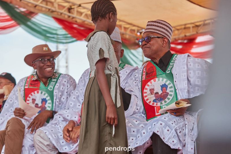 The Labour Party's presidential candidate with a school pupil in Bauchi