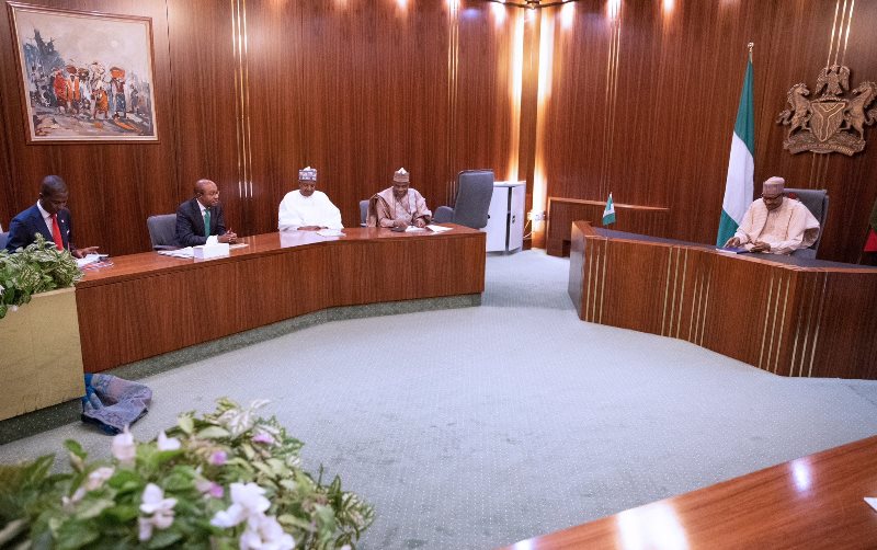 The president with others at the meeting on Tuesday.