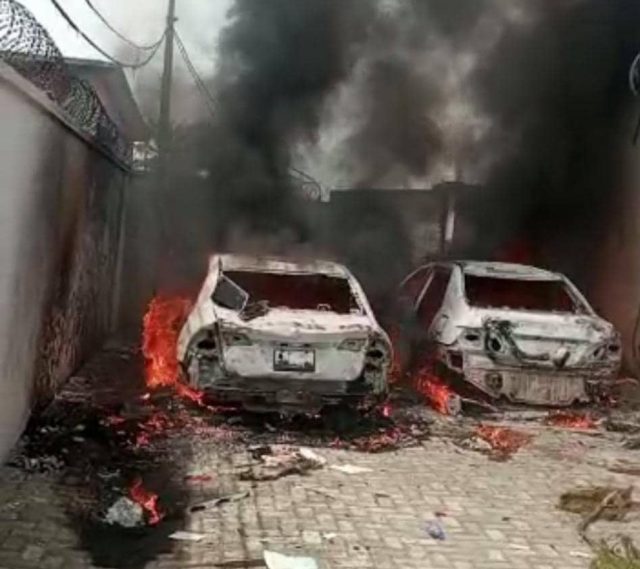 Cars set ablaze during the protest in Delta