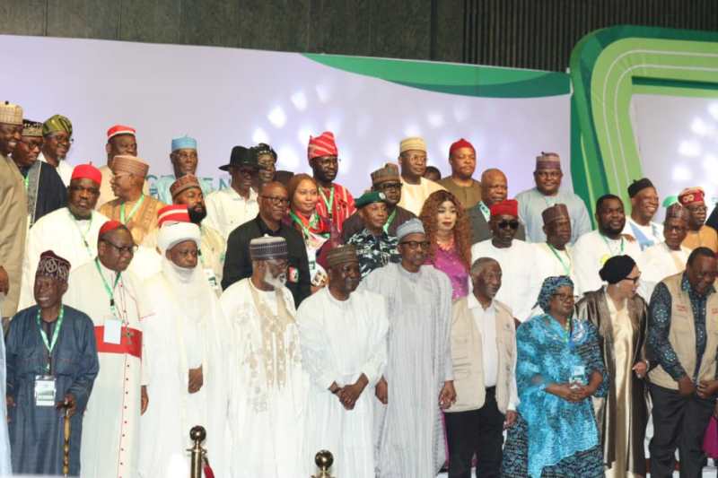 The presidential candidates, with Buhari and others during signing