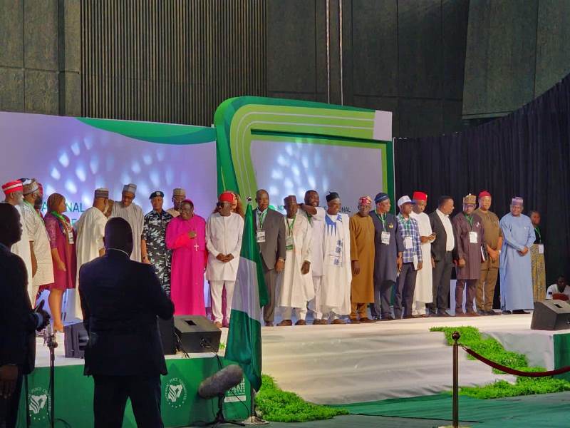 The presidential candidates, with Buhari and others during signing