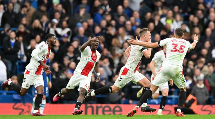Southampton players celebrate their goal against Chelsea