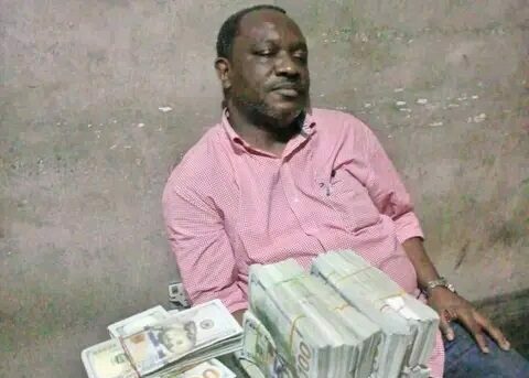 Chinyere Igwe, with the wads of about $500,000 US dollars meant to bribe Security agencies and INEC Officers.