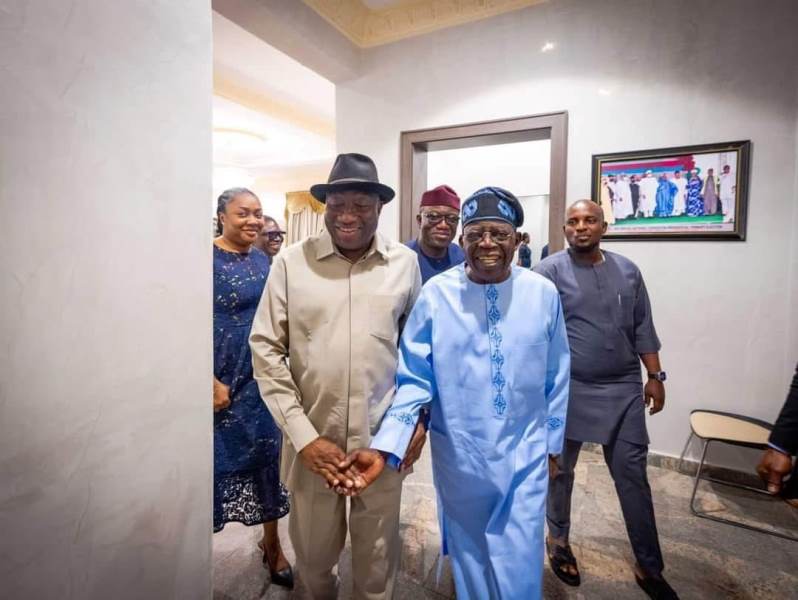Tinubu with former president during the visit