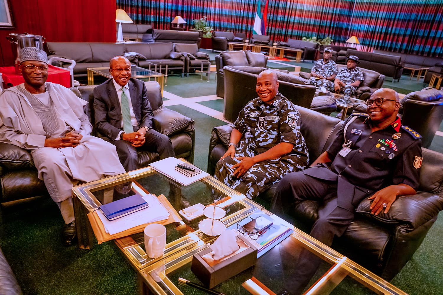 CBN Governor Godwin Emefiele and INEC Chairman Mahmood Yakubu waiting to brief the meeting